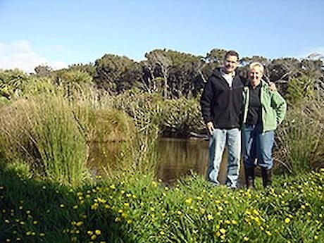 Chris and Brian Rance by their pond.
