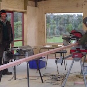 Derek and Ray fitting out the building