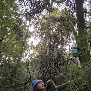 Anna and Sararose in our tall bush