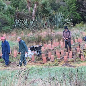 Brian with volunteers on Friday planting